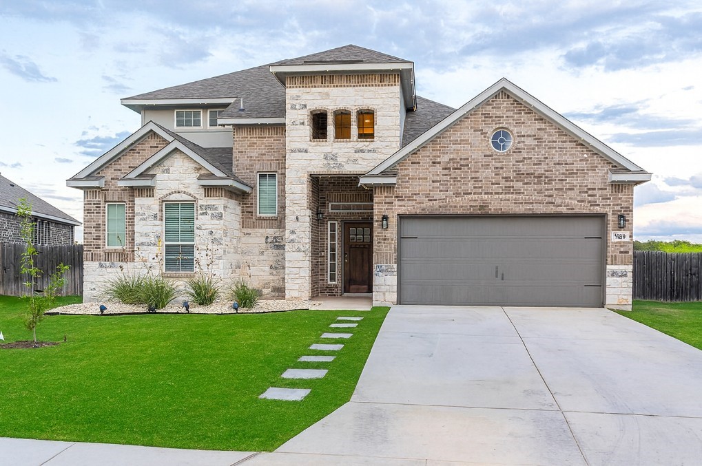 830 Rench New Braunfels, TX 78130 - Photo 2 of 50 a front view of house with yard and green space
