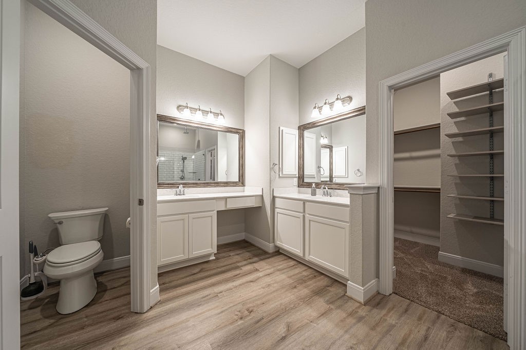 830 Rench New Braunfels, TX 78130 - Photo 22 of 50 a room with a white stove and a refrigerator