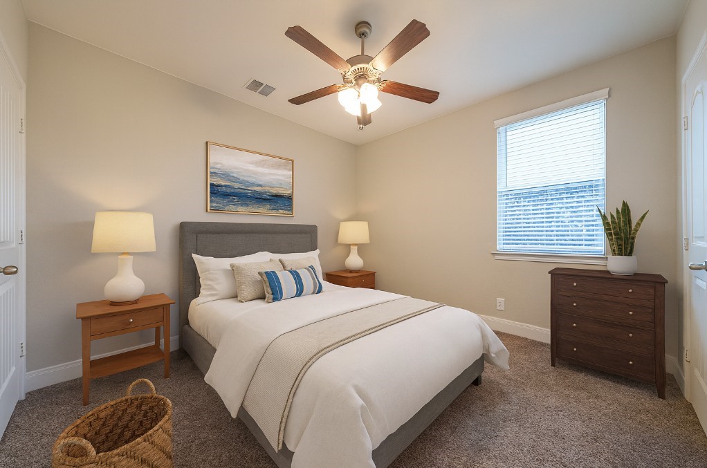 830 Rench New Braunfels, TX 78130 - Photo 32 of 50 a bedroom with a bed a dresser and a window