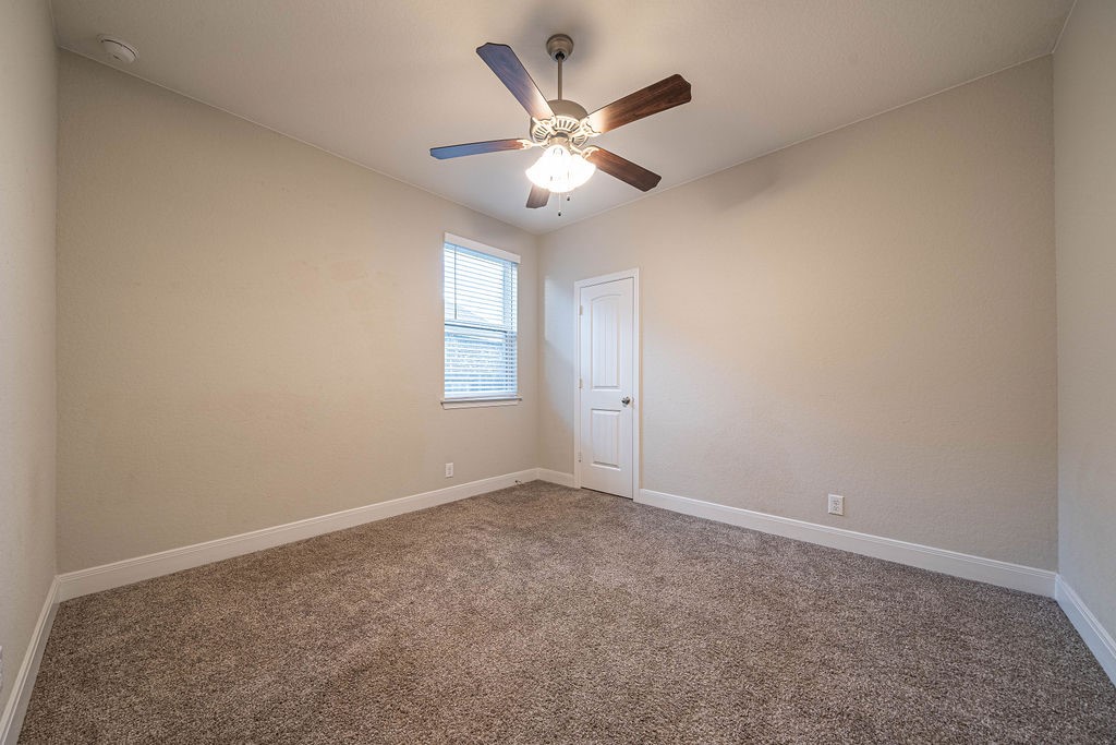 830 Rench New Braunfels, TX 78130 - Photo 33 of 50 an empty room with closet and windows