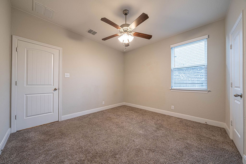 830 Rench New Braunfels, TX 78130 - Photo 34 of 50 an empty room with closet and windows