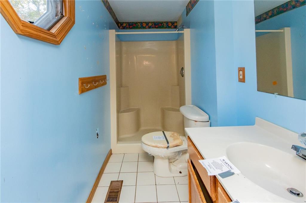 31 Hones Road Export, PA 15632 - Photo 21 of 22 a bathroom with a sink and a toilet