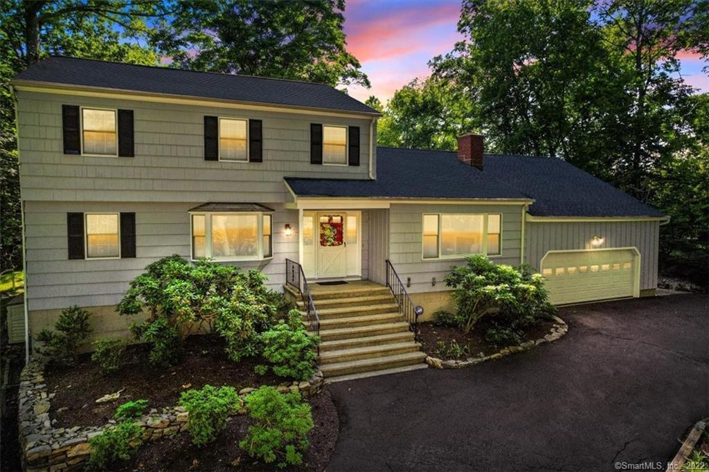 43 Cranbury Road Norwalk, CT 06851 - Photo 1 of 1 a front view of a house with garden