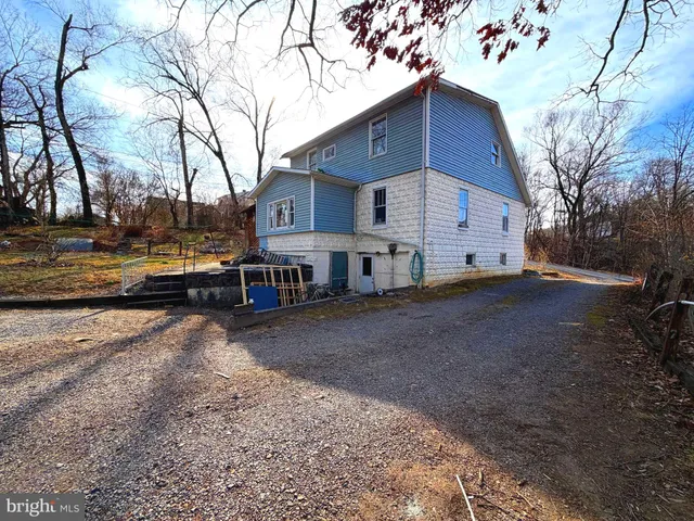 a view of a town with brick walls