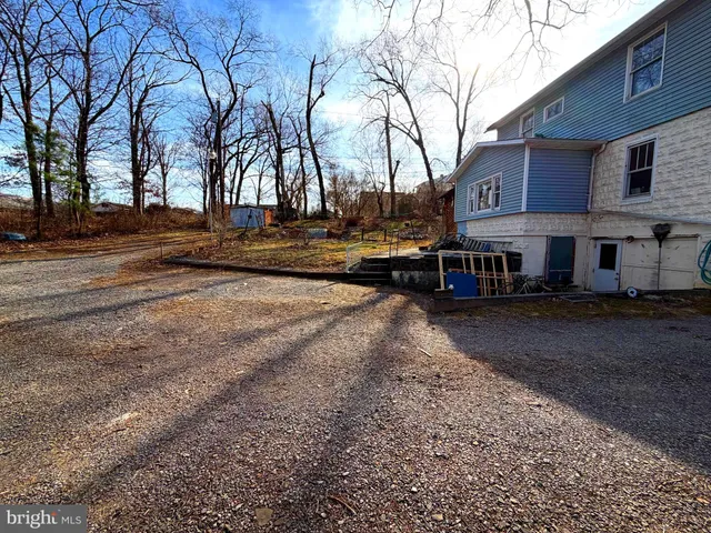 a house view with a backyard space