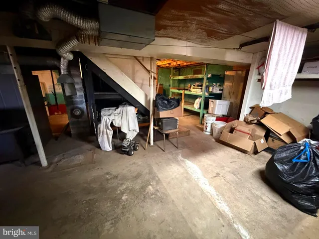 a room with furniture and a window