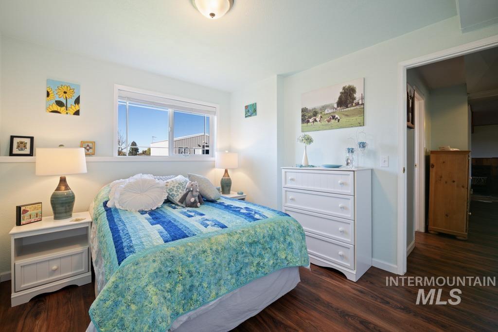 3828 15th Street Lewiston, ID 83501 - Photo 18 of 34 Bedroom featuring dark wood finished floors