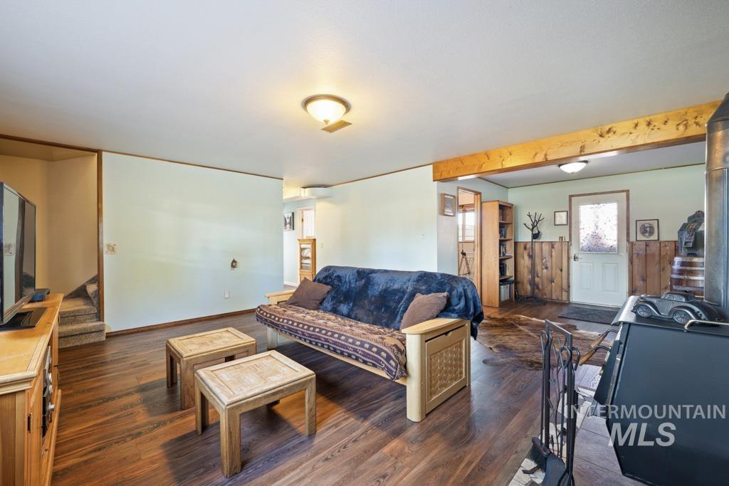 3828 15th Street Lewiston, ID 83501 - Photo 21 of 34 Living area with dark wood finished floors and stairway