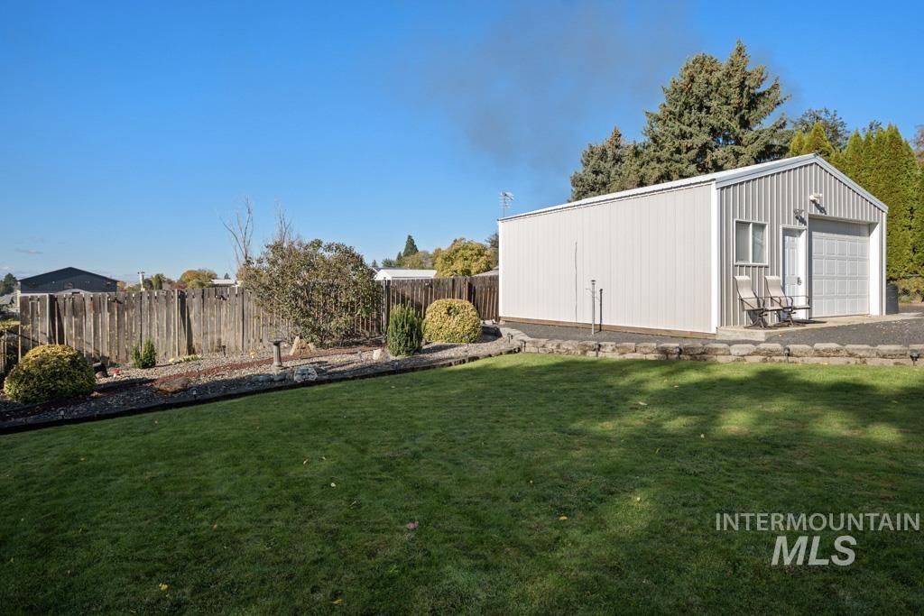 3828 15th Street Lewiston, ID 83501 - Photo 27 of 34 View of yard featuring an outbuilding and a detached garage
