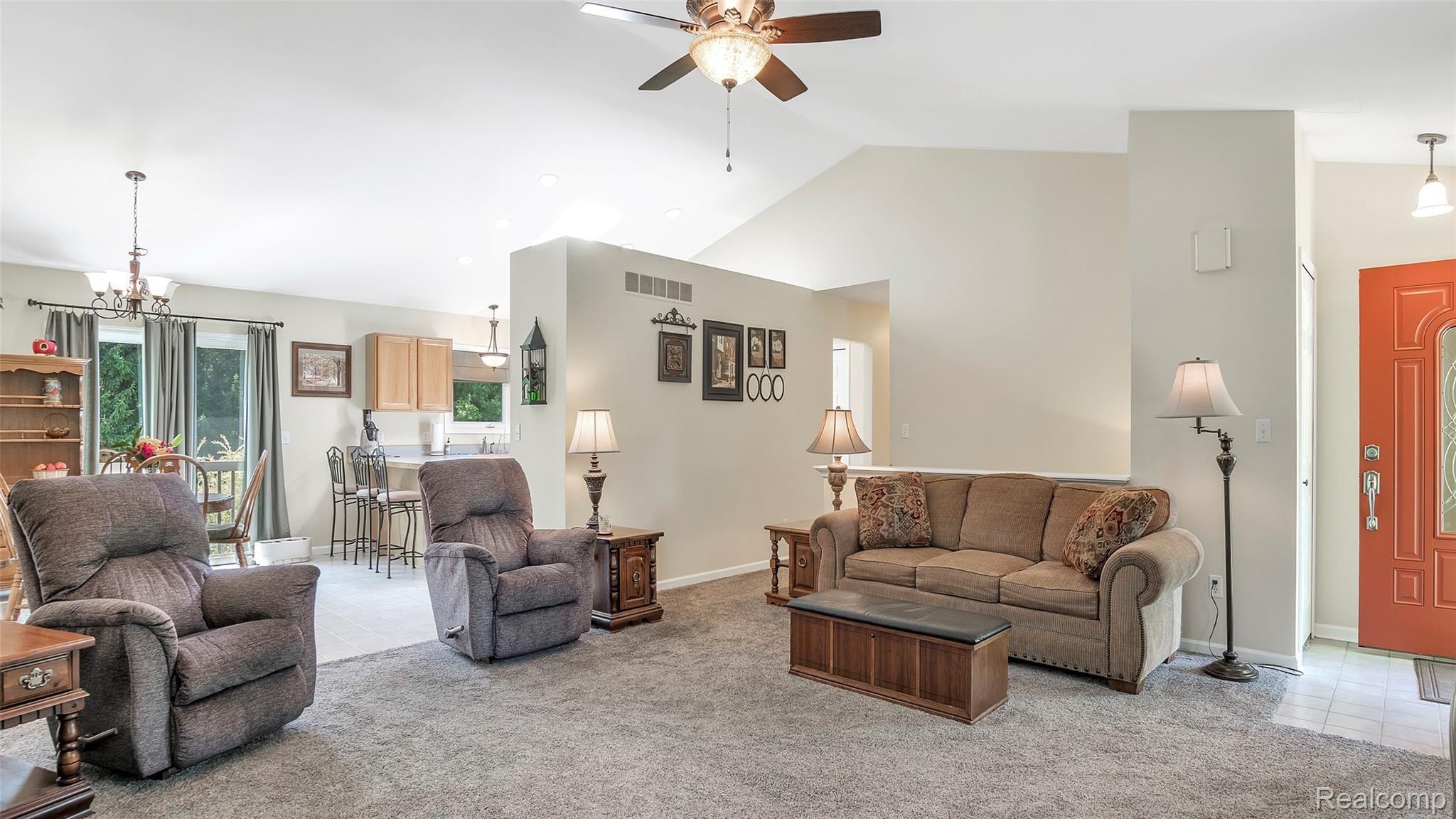 6063 Rivers Edge Drive Howell, MI 48855 - Photo 6 of 39 Large living room, open to dining area!