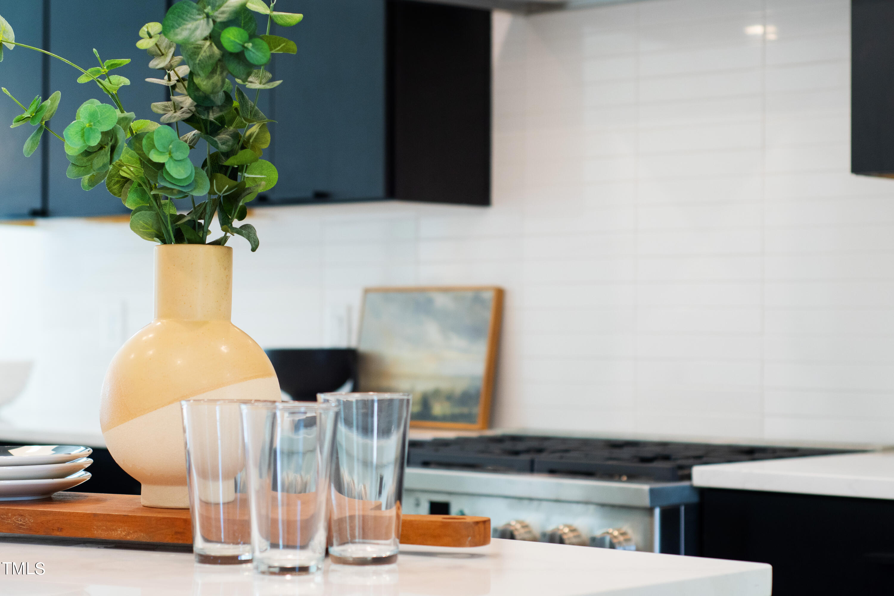 716 Brighton Road, Unit 102 Raleigh, NC 27610 - Photo 24 of 78 a vase of flowers sitting on a table