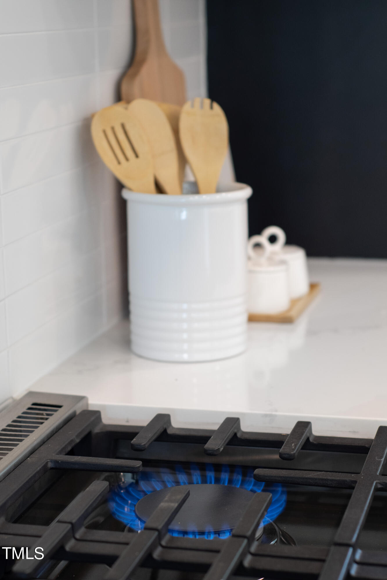 716 Brighton Road, Unit 102 Raleigh, NC 27610 - Photo 26 of 78 a close up of a sink and a stove