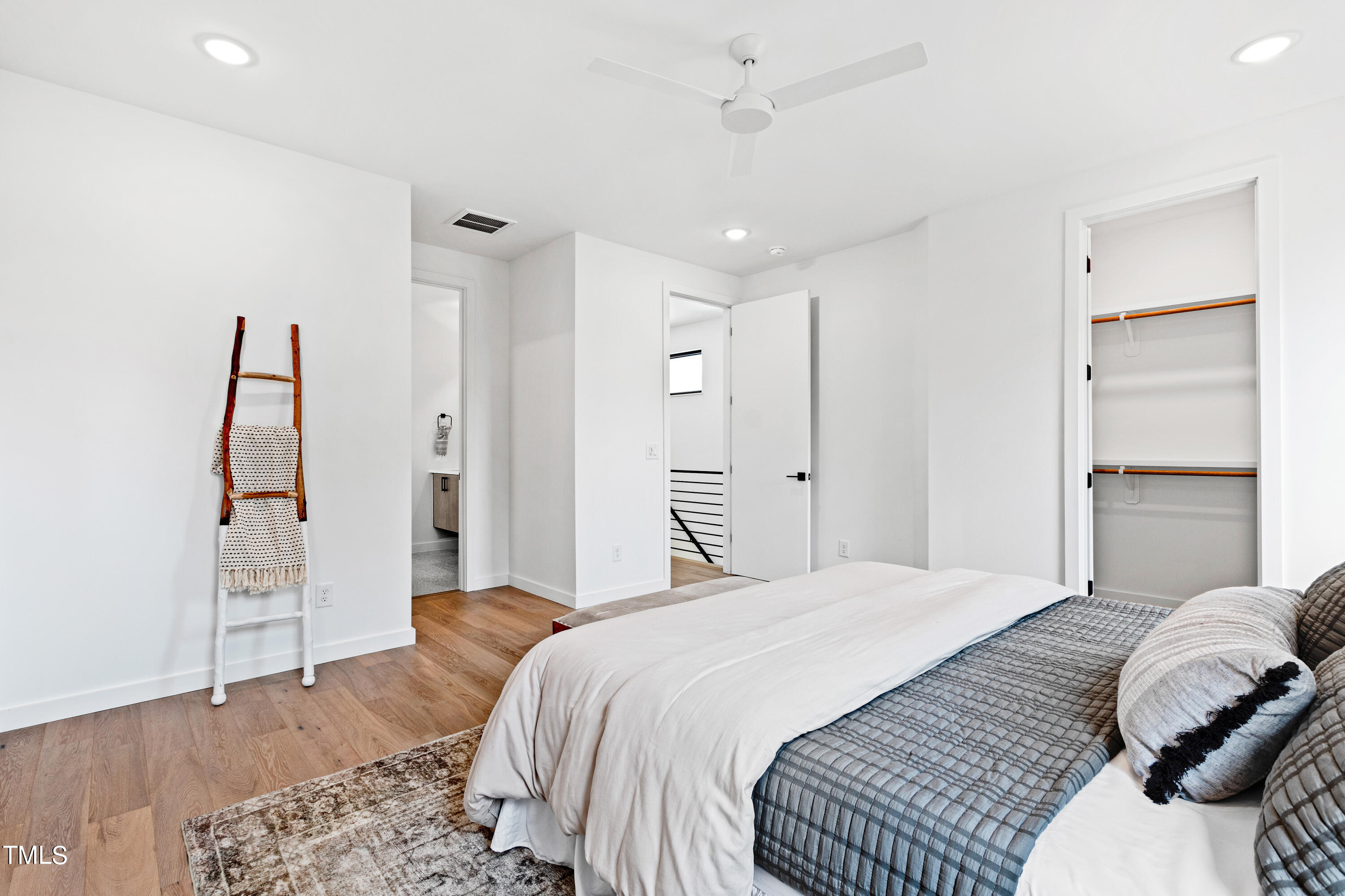 716 Brighton Road, Unit 102 Raleigh, NC 27610 - Photo 41 of 78 a bedroom with a bed and a dresser