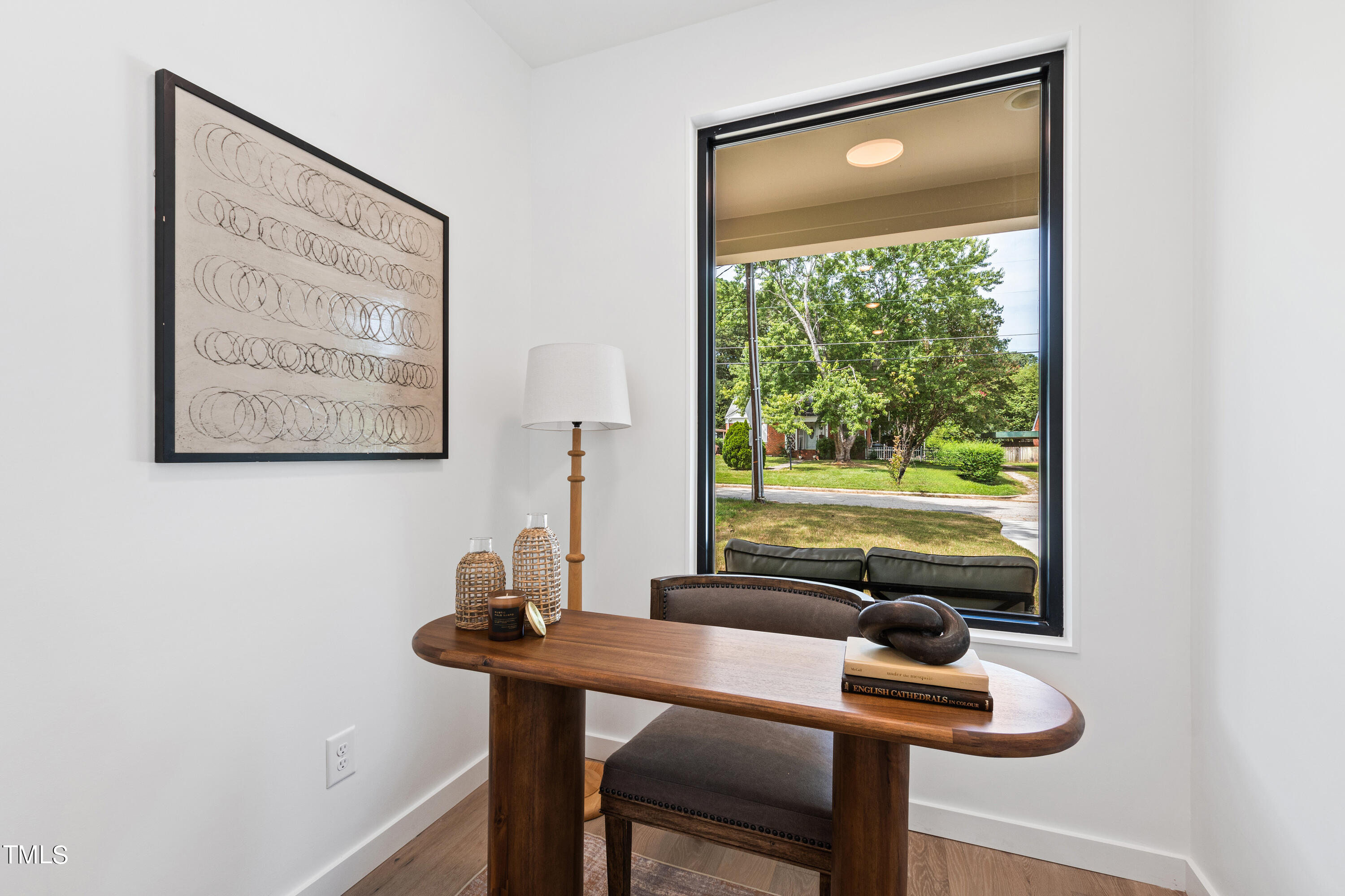 716 Brighton Road, Unit 102 Raleigh, NC 27610 - Photo 63 of 78 a view of a workspace with furniture and window