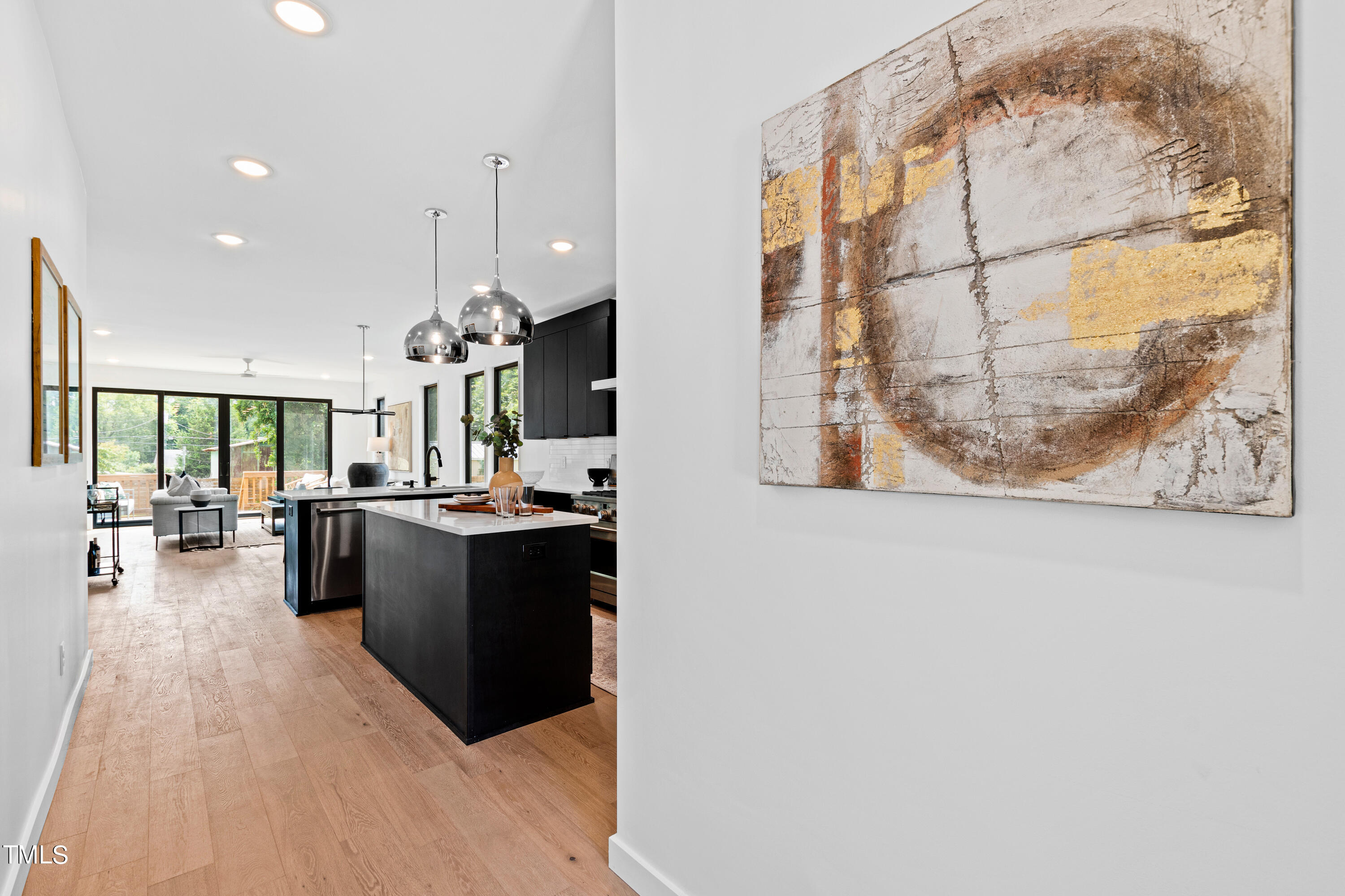 716 Brighton Road, Unit 102 Raleigh, NC 27610 - Photo 8 of 78 a living room with furniture and a large window