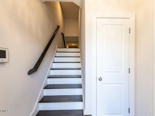 a view of entryway with wooden floor