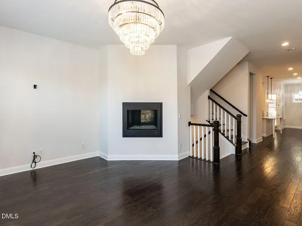 a view of a livingroom with wooden floor