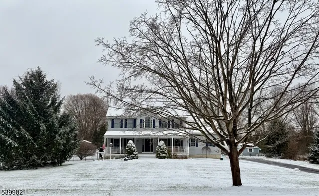 a view of a building with a yard