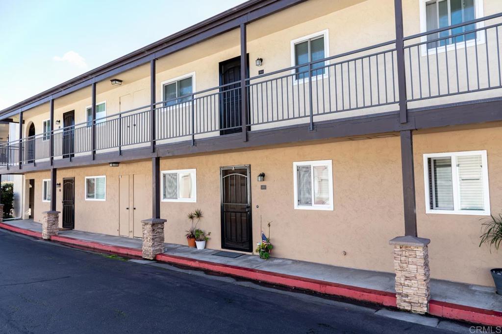 a front view of a building with garage
