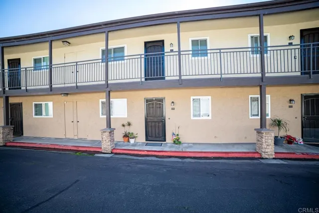 a front view of a building with glass windows