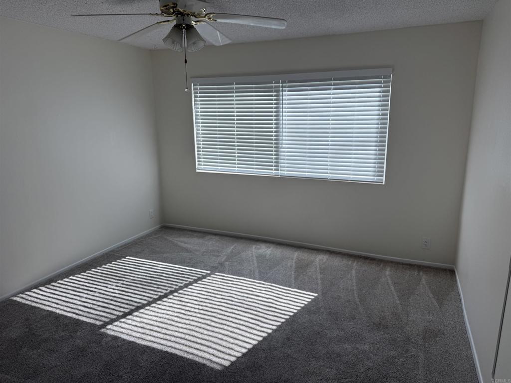800 Encinitas Boulevard, Unit 104 Encinitas, CA 92024 - Photo 9 of 14 an empty room with a window