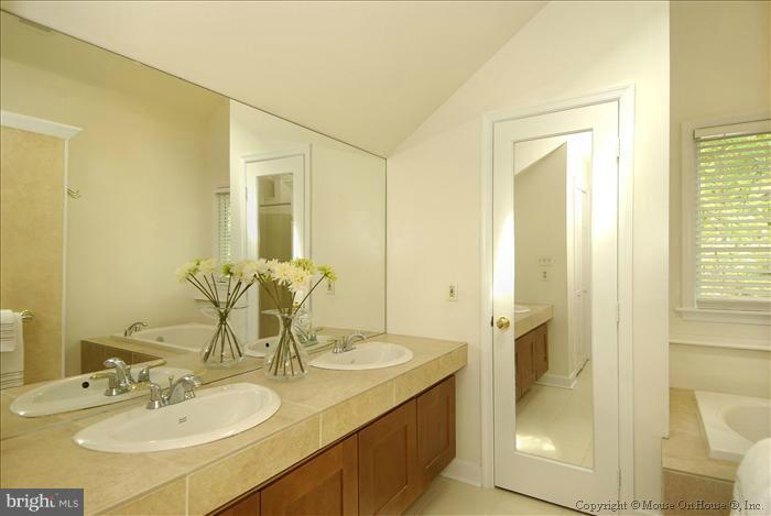 1716 Beulah Road Vienna, VA 22182 - Photo 12 of 30 a bathroom with a sink and a mirror