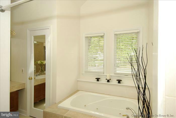 1716 Beulah Road Vienna, VA 22182 - Photo 20 of 30 a bathroom with a bathtub and a shower