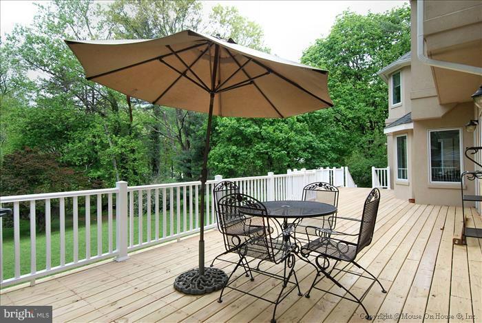 1716 Beulah Road Vienna, VA 22182 - Photo 23 of 30 a view of balcony with furniture and wooden deck