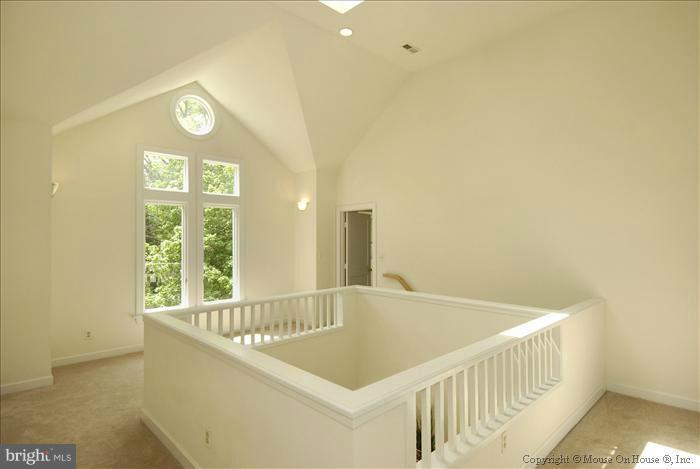 1716 Beulah Road Vienna, VA 22182 - Photo 7 of 30 a white bath tub sitting in a bathroom