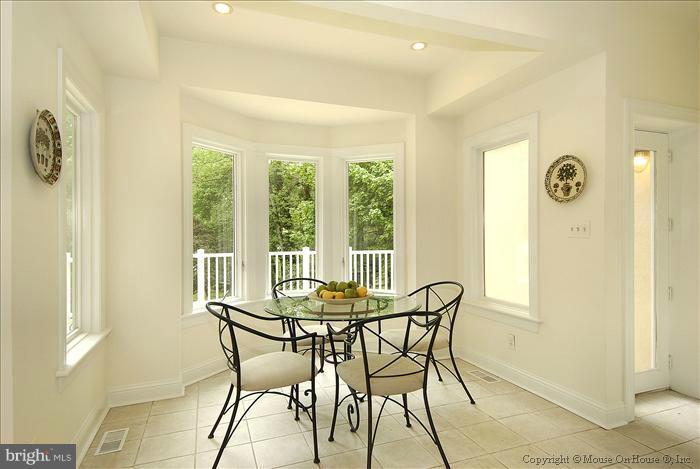 1716 Beulah Road Vienna, VA 22182 - Photo 9 of 30 a dining room with furniture and a window