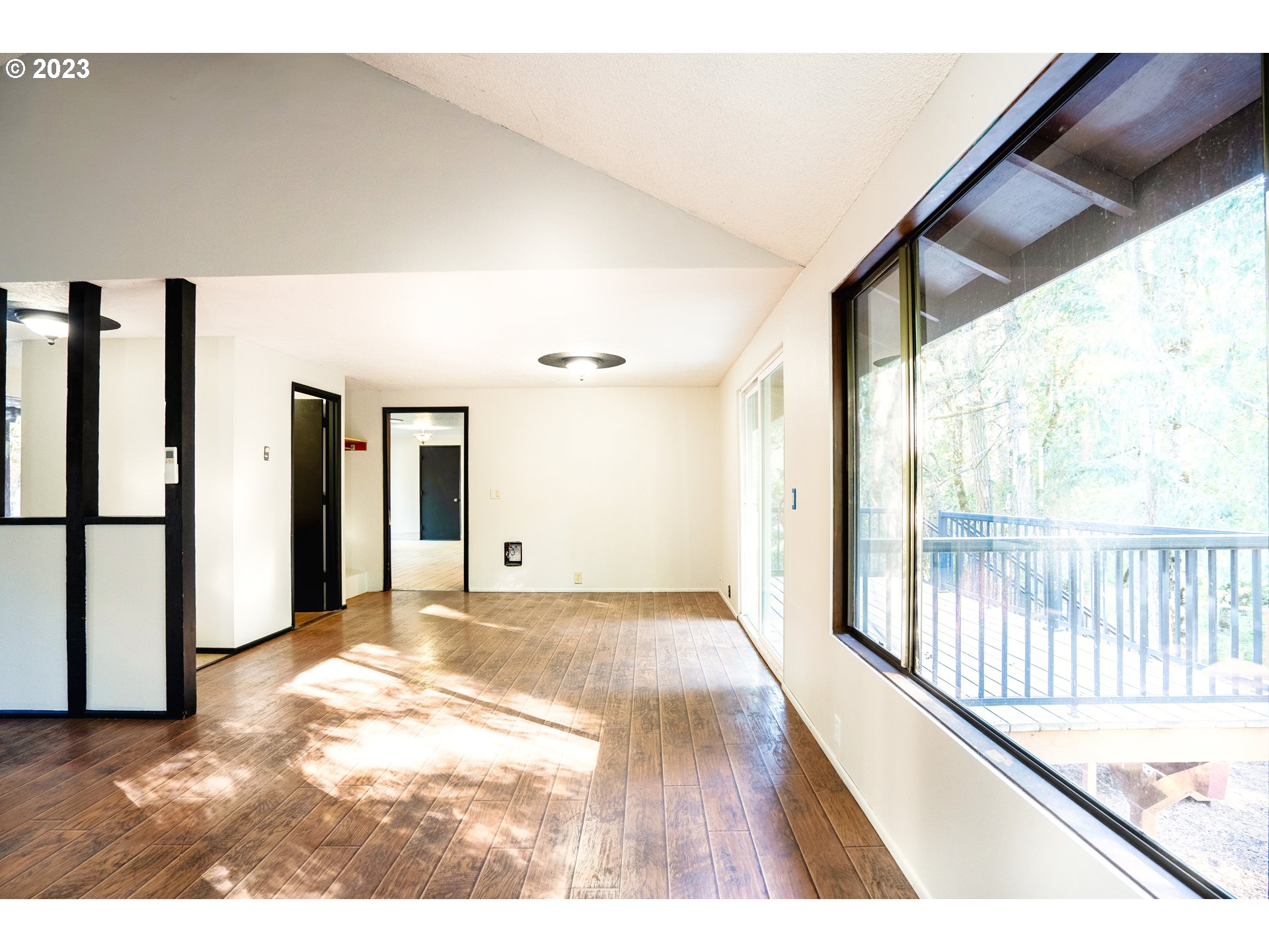 4146 Normandy Way Eugene, OR 97405 - Photo 12 of 48 a view interior of a house with wooden floor and windows