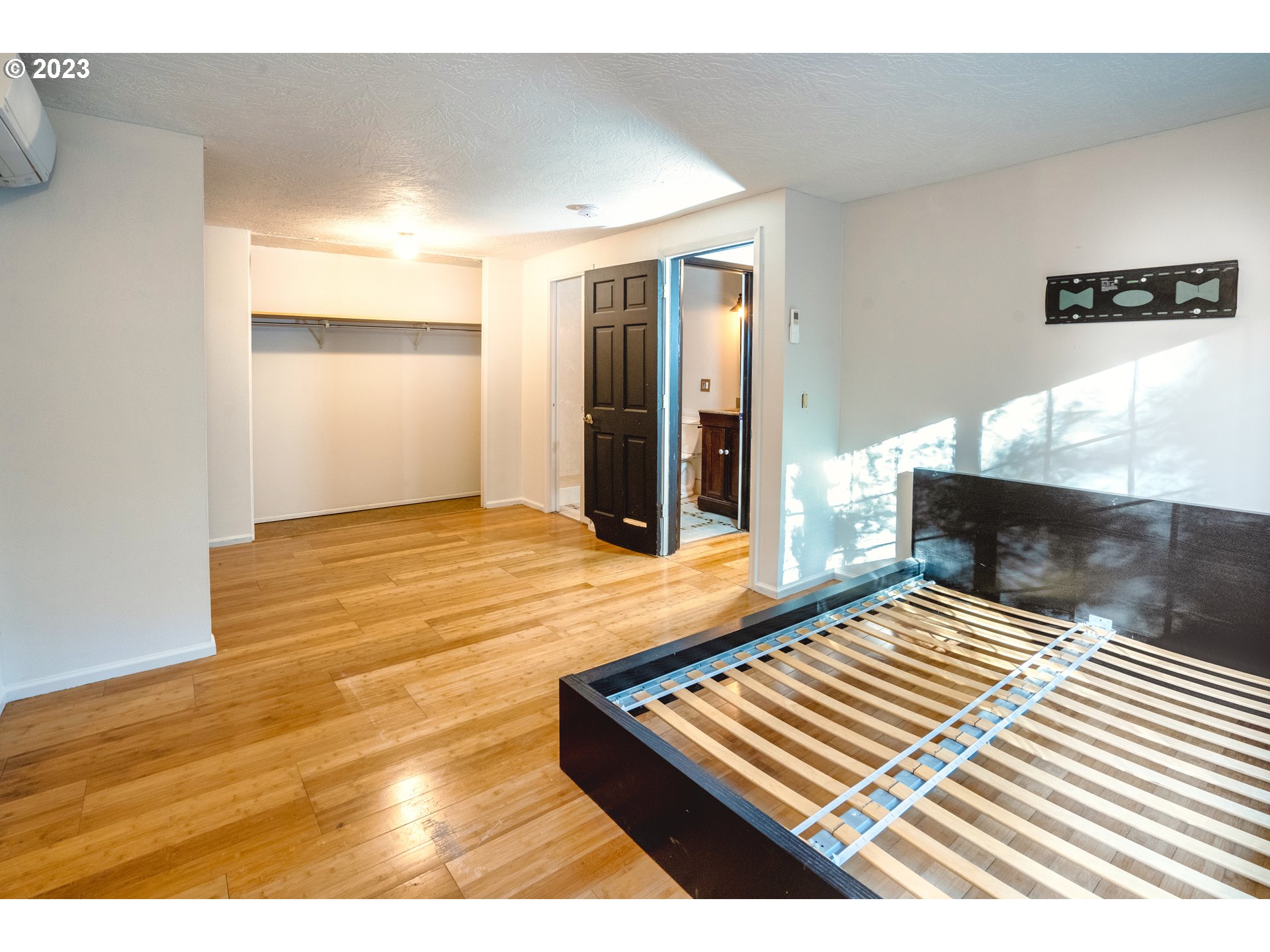 4146 Normandy Way Eugene, OR 97405 - Photo 35 of 48 a bedroom with a bed and a dresser