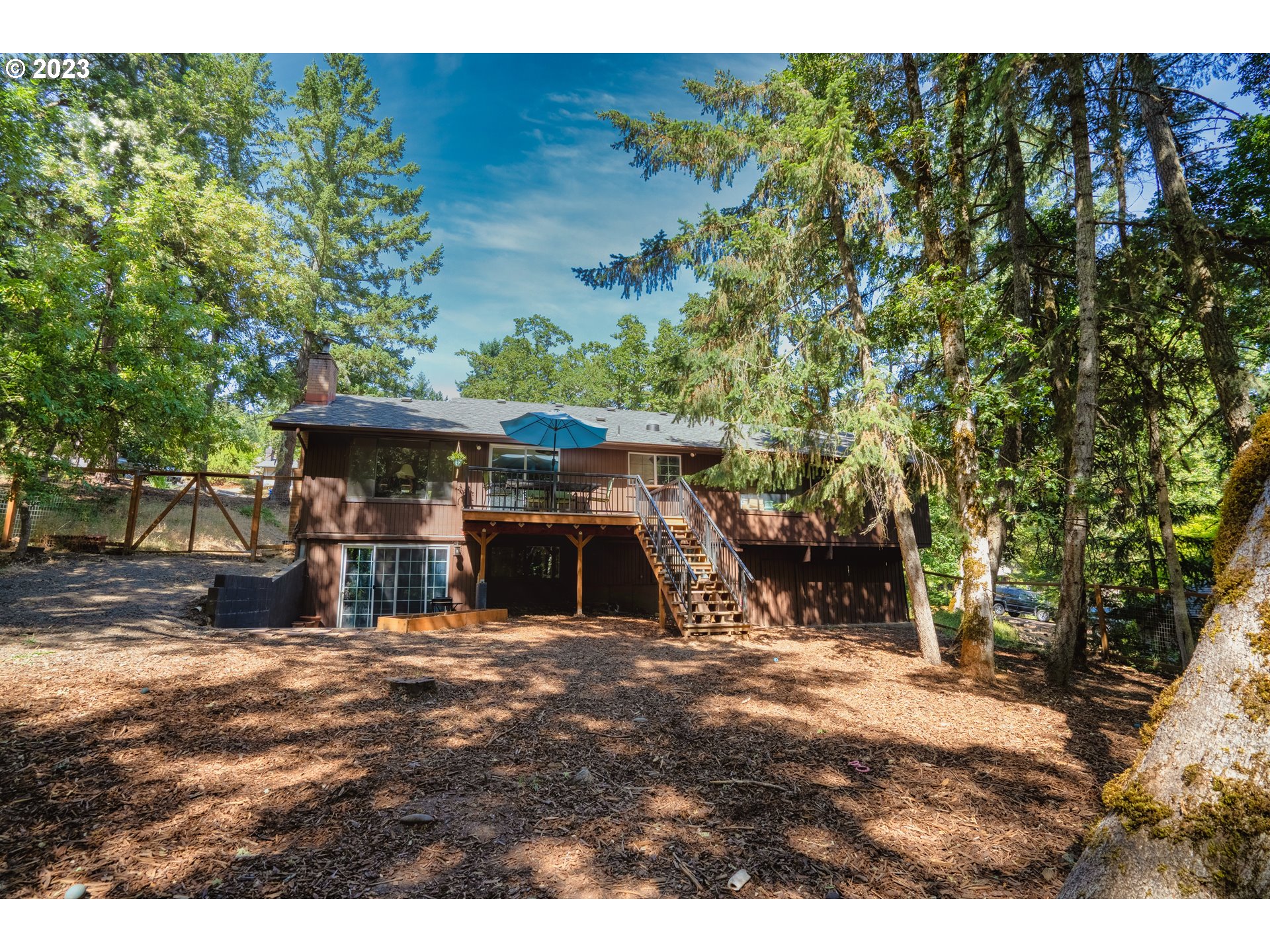 4146 Normandy Way Eugene, OR 97405 - Photo 40 of 48 a view of a chairs and table in the patio