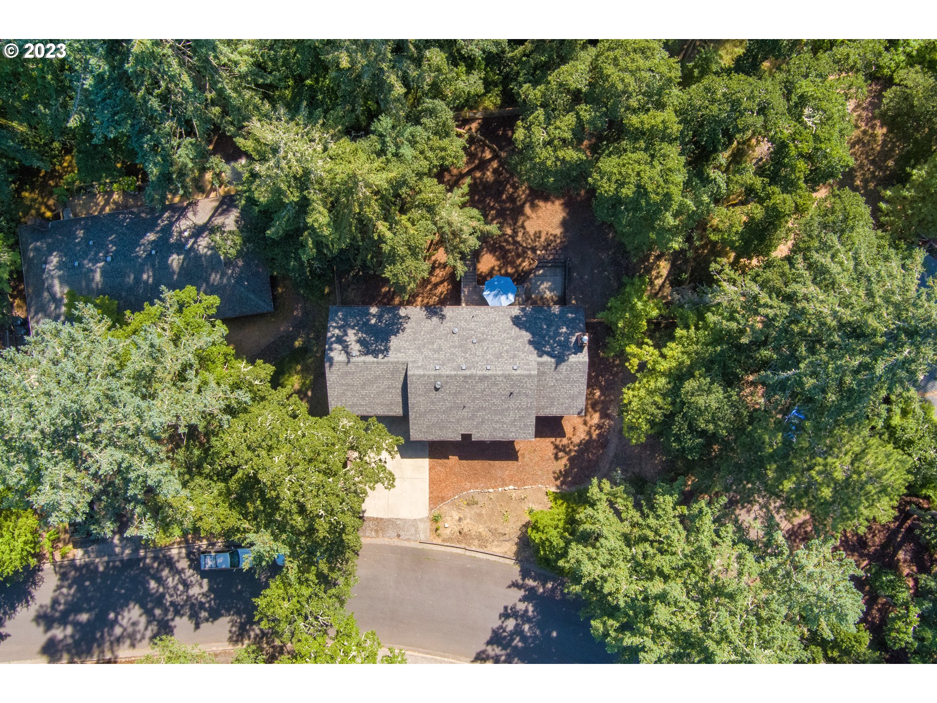 4146 Normandy Way Eugene, OR 97405 - Photo 48 of 48 an aerial view of a house with a yard