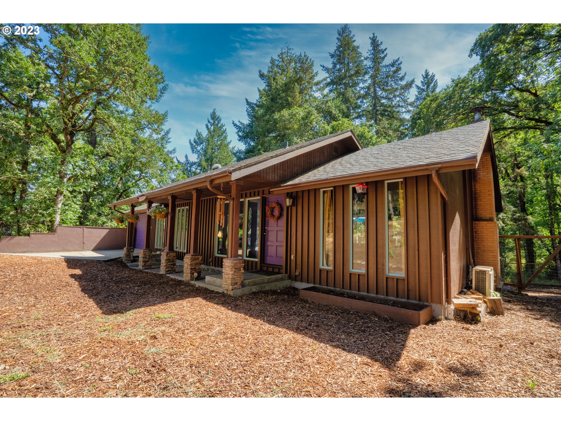 4146 Normandy Way Eugene, OR 97405 - Photo 7 of 48 a backyard of a house with yard barbeque oven and outdoor seating