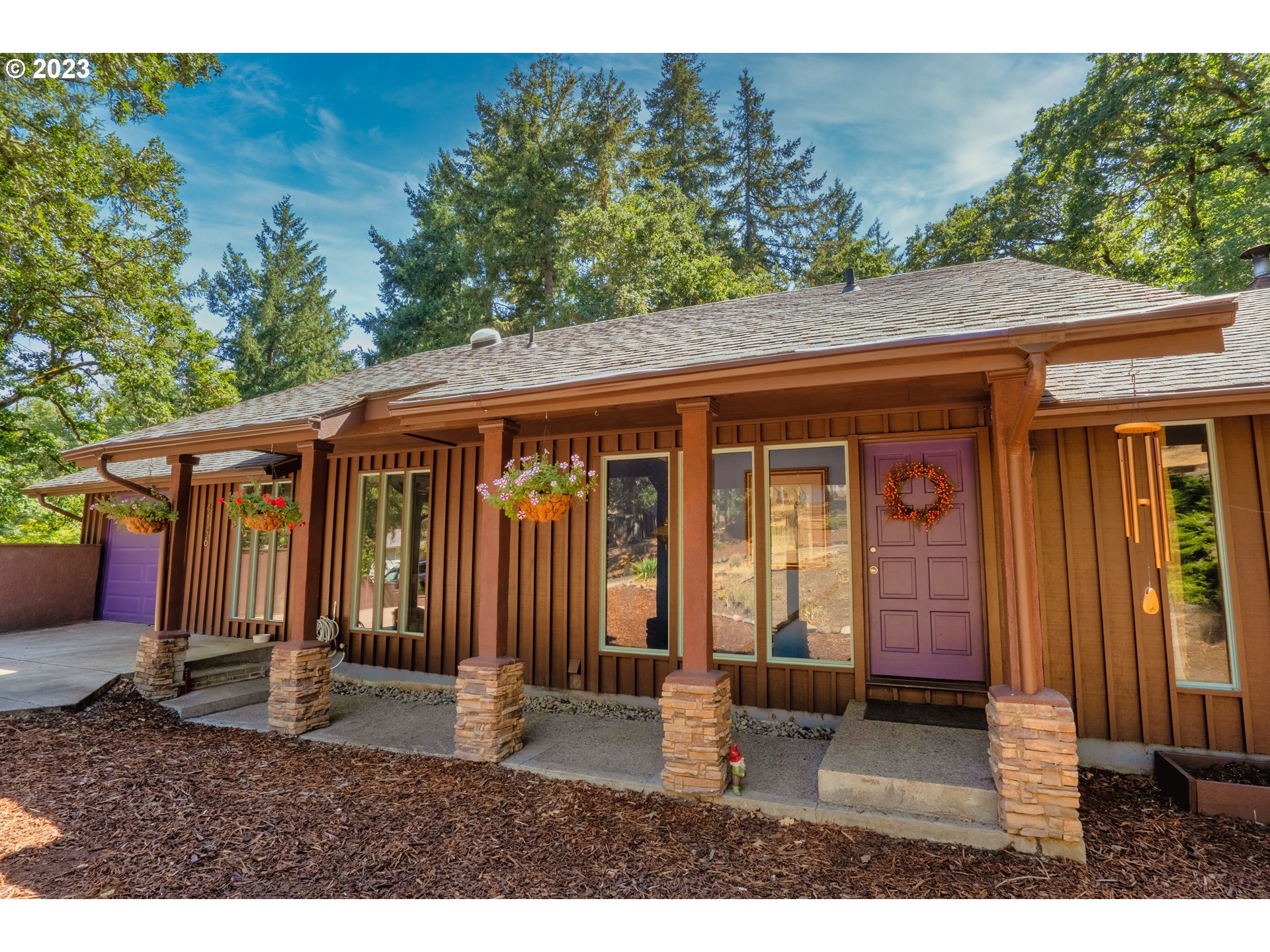 4146 Normandy Way Eugene, OR 97405 - Photo 8 of 48 a backyard of a house with seating space