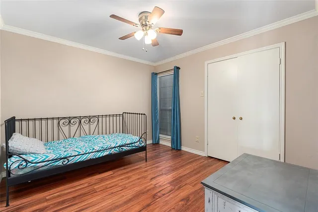 a view of balcony with wooden floor