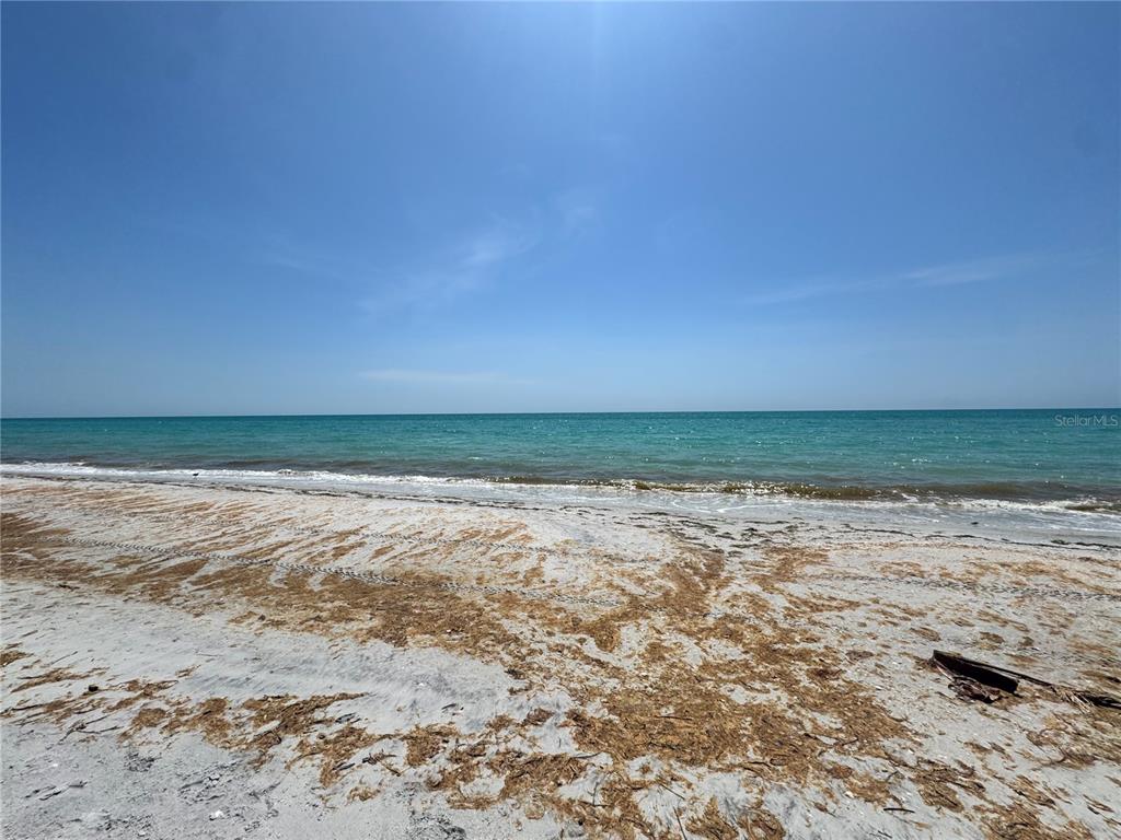 8992 Seagrape Lane Boca Grande, FL 33921 - Photo 21 of 28 a view of ocean view with beach