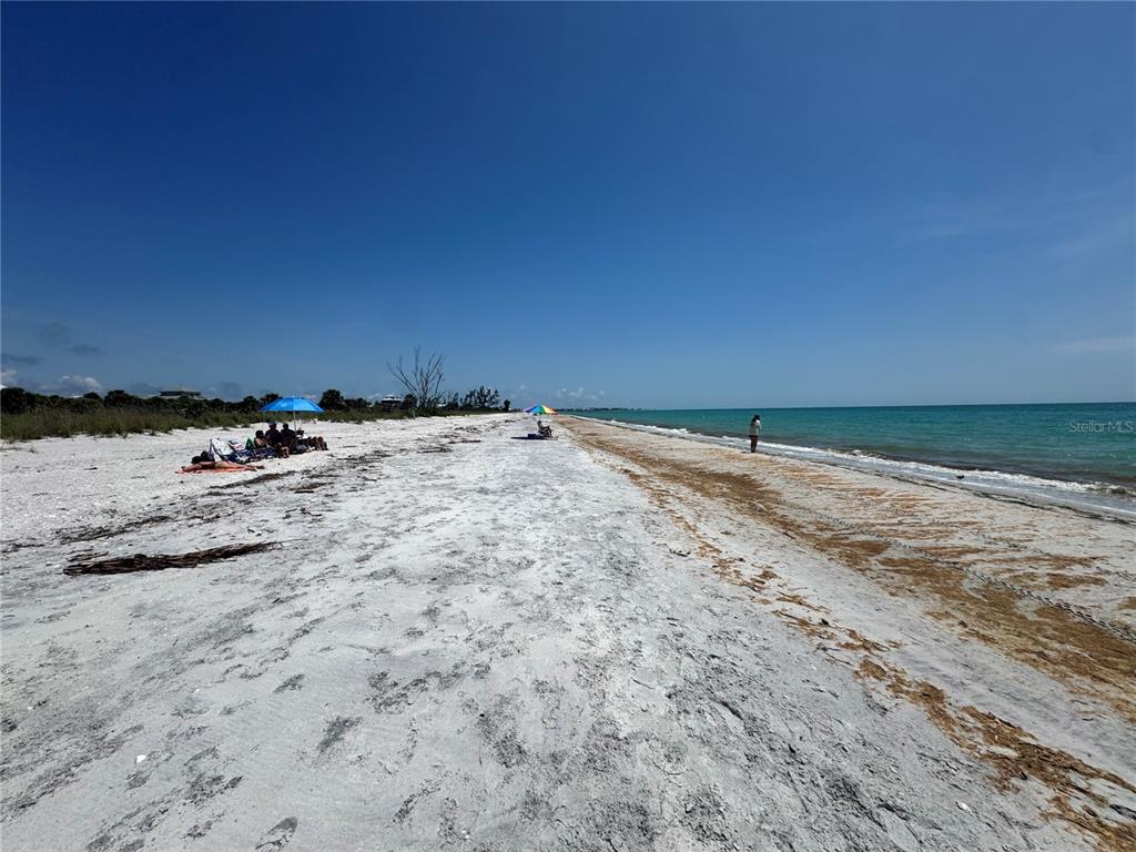 8992 Seagrape Lane Boca Grande, FL 33921 - Photo 23 of 28 a view of ocean with beach