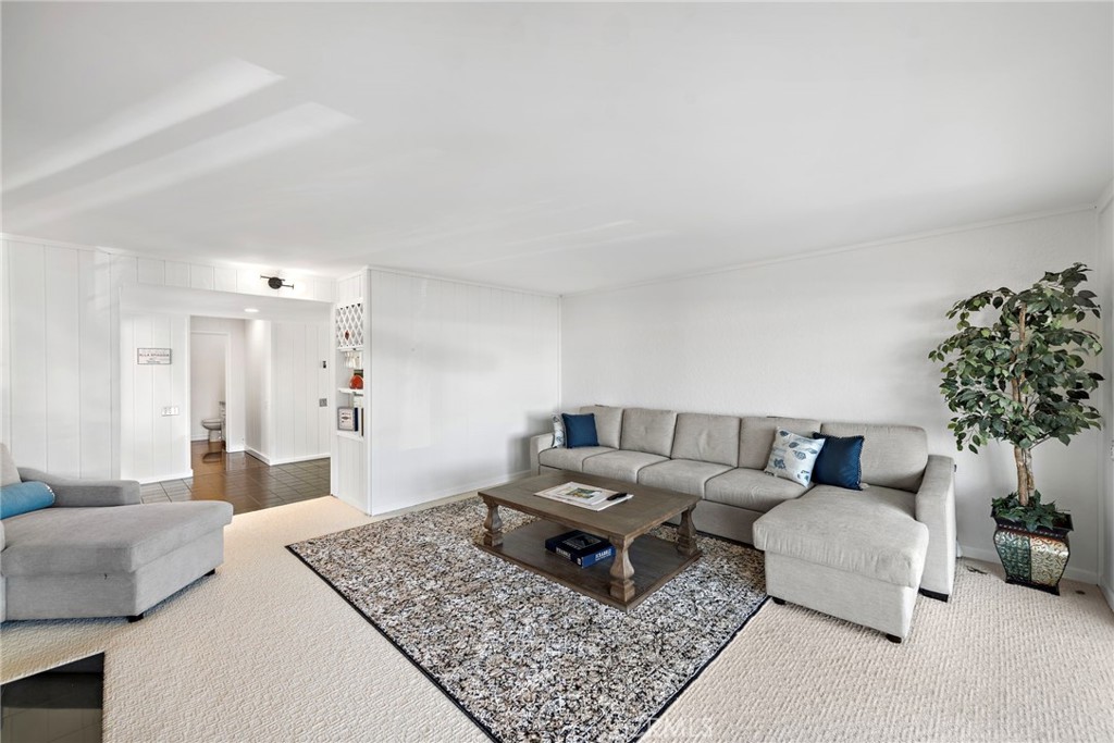 1707 West Balboa Boulevard, Unit A Newport Beach, CA 92663 - Photo 11 of 30 a living room with furniture and a couch