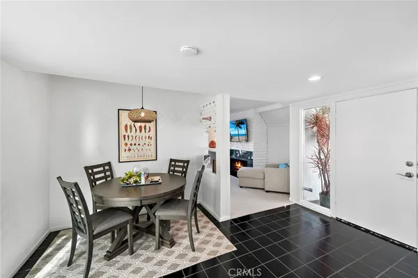 a living room with furniture and white walls