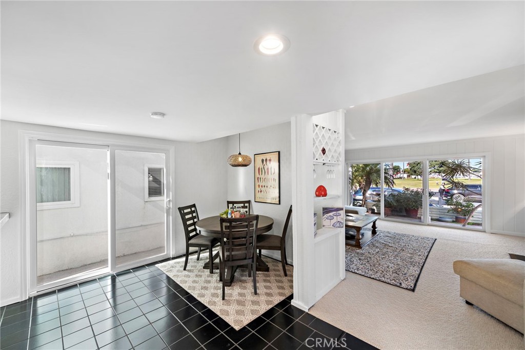 1707 West Balboa Boulevard, Unit A Newport Beach, CA 92663 - Photo 6 of 30 a living room with furniture and white walls