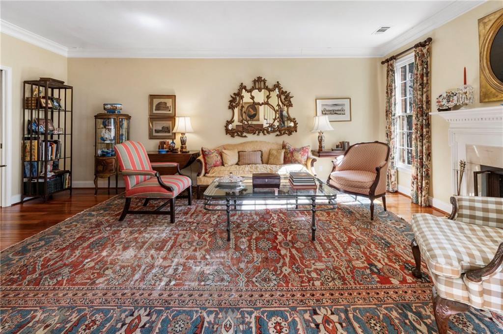 3127 Vinings Ridge Drive Southeast Atlanta, GA 30339 - Photo 16 of 33 a living room with furniture and a rug