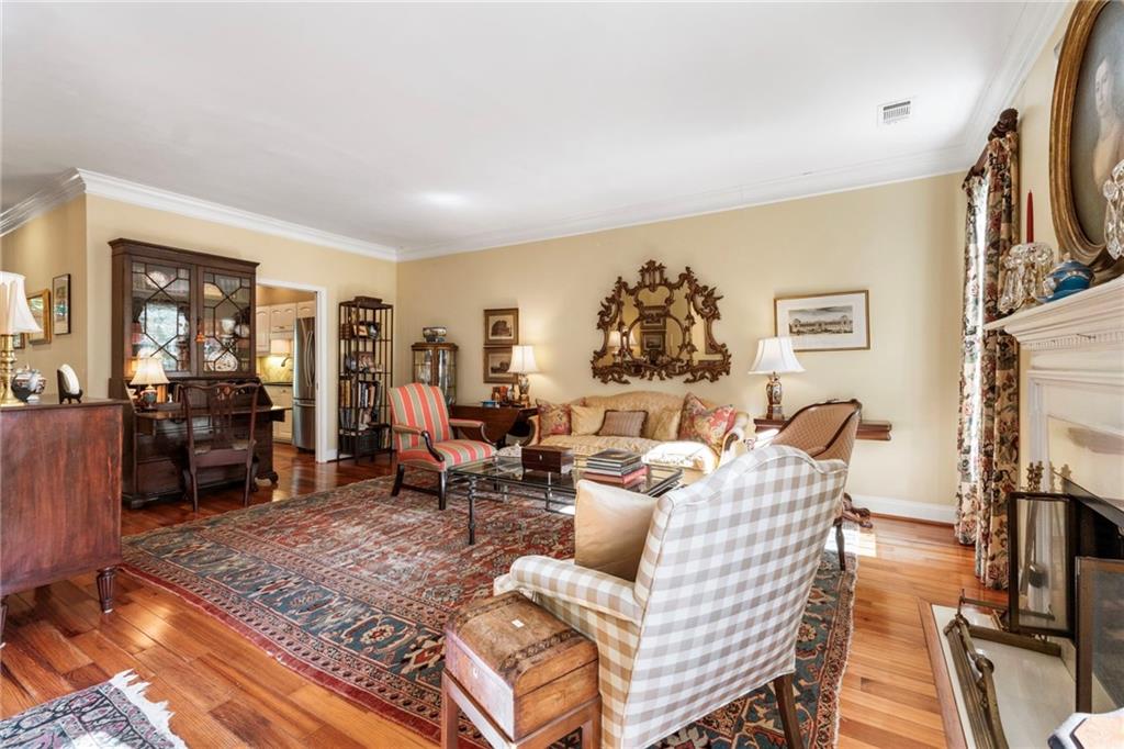 3127 Vinings Ridge Drive Southeast Atlanta, GA 30339 - Photo 17 of 33 a living room with fireplace furniture and a flat screen tv