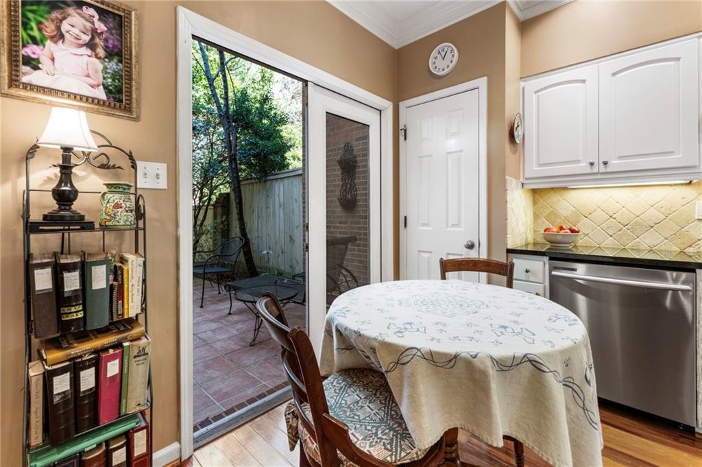 3127 Vinings Ridge Drive Southeast Atlanta, GA 30339 - Photo 18 of 33 a view of a dining room with furniture window and wooden floor