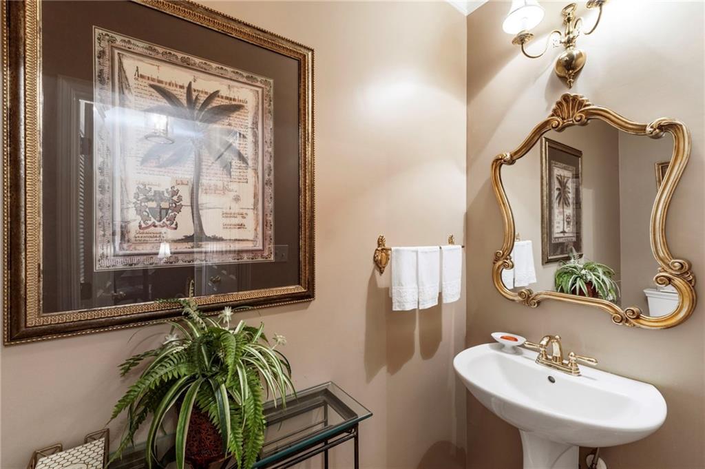 3127 Vinings Ridge Drive Southeast Atlanta, GA 30339 - Photo 21 of 33 a bathroom with a sink a mirror and a window