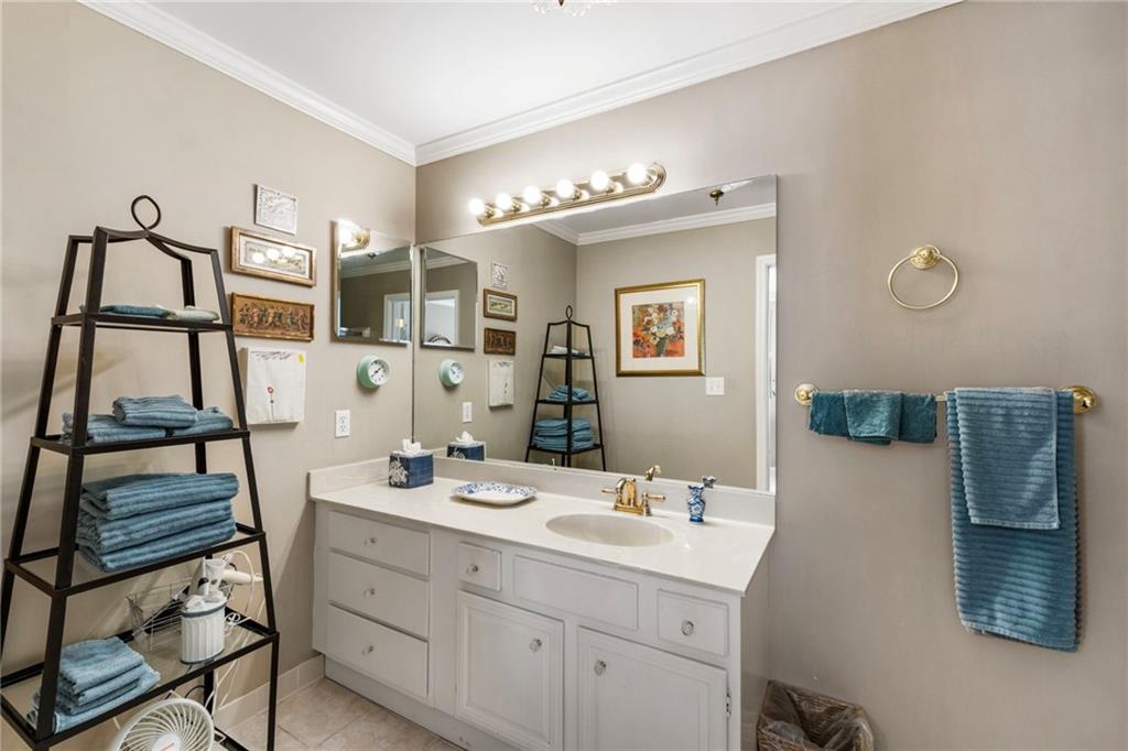 3127 Vinings Ridge Drive Southeast Atlanta, GA 30339 - Photo 23 of 33 a bathroom with a double vanity sink mirror and window
