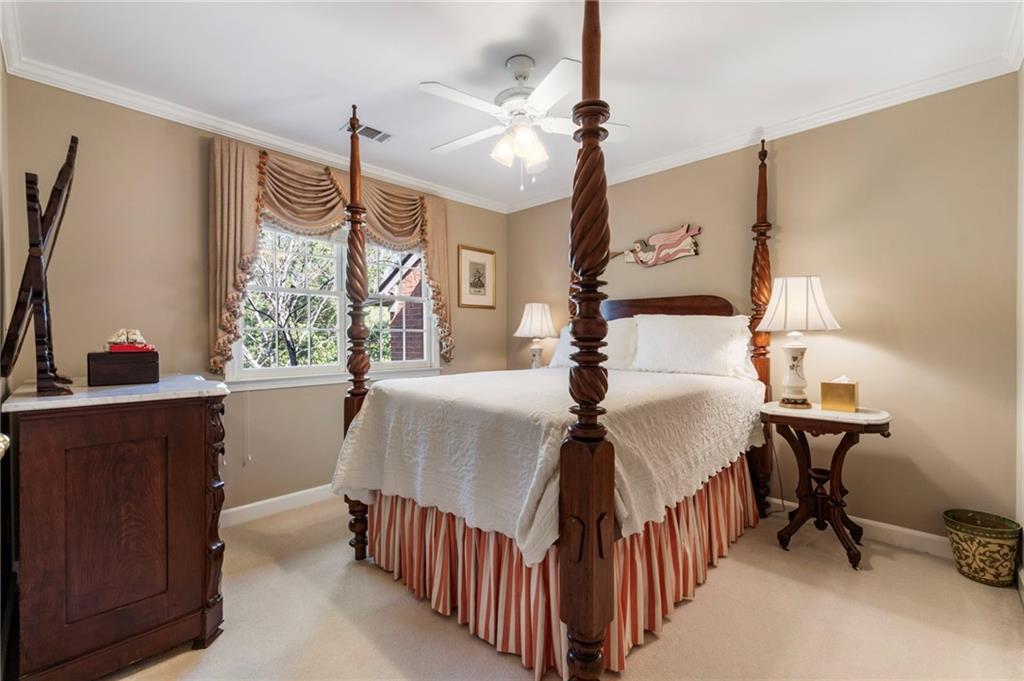 3127 Vinings Ridge Drive Southeast Atlanta, GA 30339 - Photo 24 of 33 a bedroom with furniture and a window