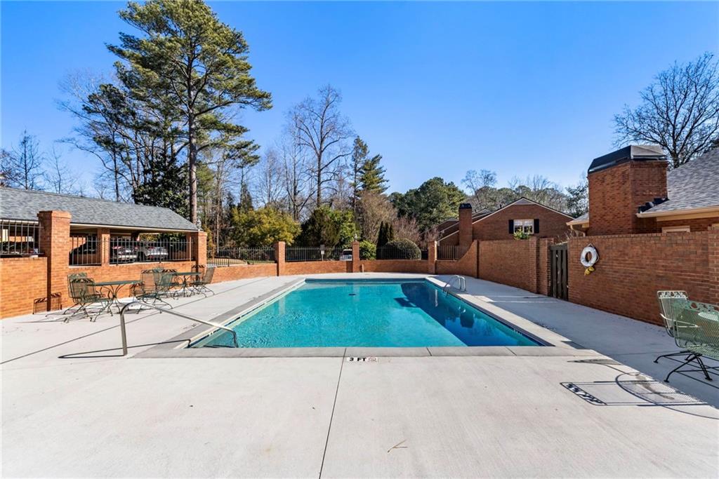 3127 Vinings Ridge Drive Southeast Atlanta, GA 30339 - Photo 29 of 33 a view of swimming pool with chairs