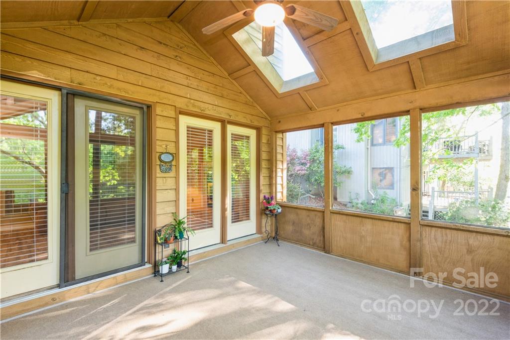 26050 Neptunes Landing Tega Cay, SC 29708 - Photo 16 of 39 a view of a room with a large window
